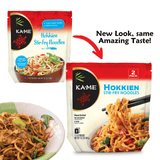 Two packages of Kä-Me Hokkien Stir-Fry Noodles with a bowl of noodles below, on a white background.