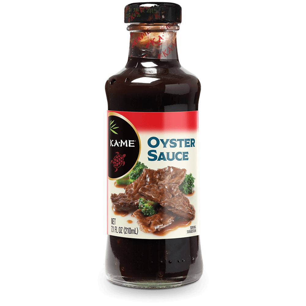 A bottle of Kame Oyster Sauce, 11 fl oz (320 mL), featuring a dark brown sauce inside, a black cap, and a label with a red top section and an image of oyster sauce on beef with broccoli.